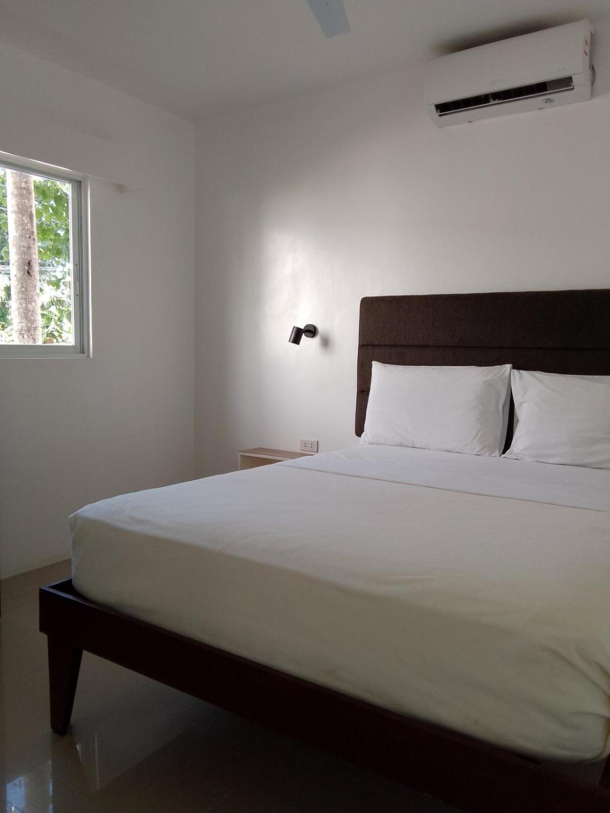 Heartland Hotel Serviced Rooms & Apartments. Панглао Екстериор снимка
