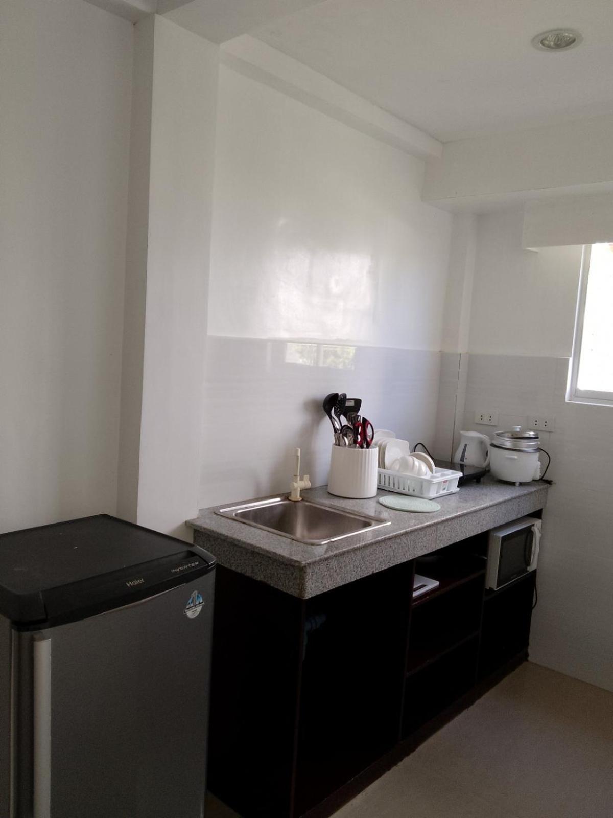 Heartland Hotel Serviced Rooms & Apartments. Панглао Екстериор снимка