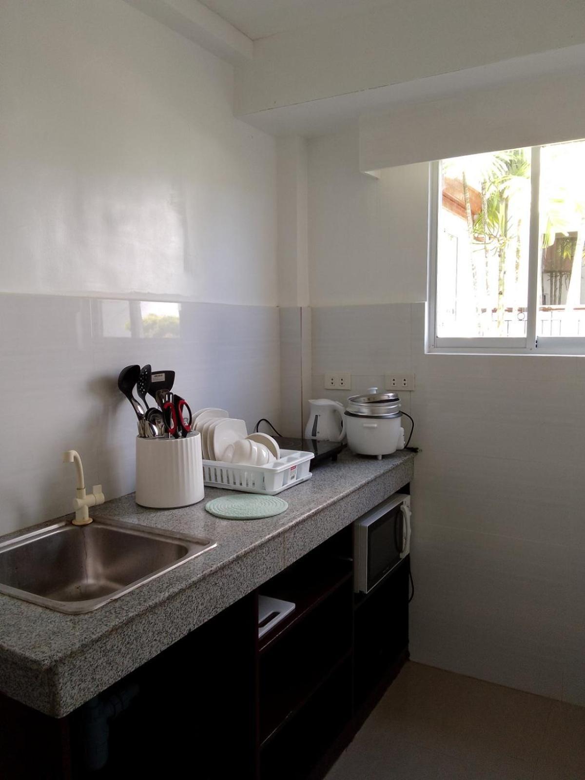 Heartland Hotel Serviced Rooms & Apartments. Панглао Екстериор снимка