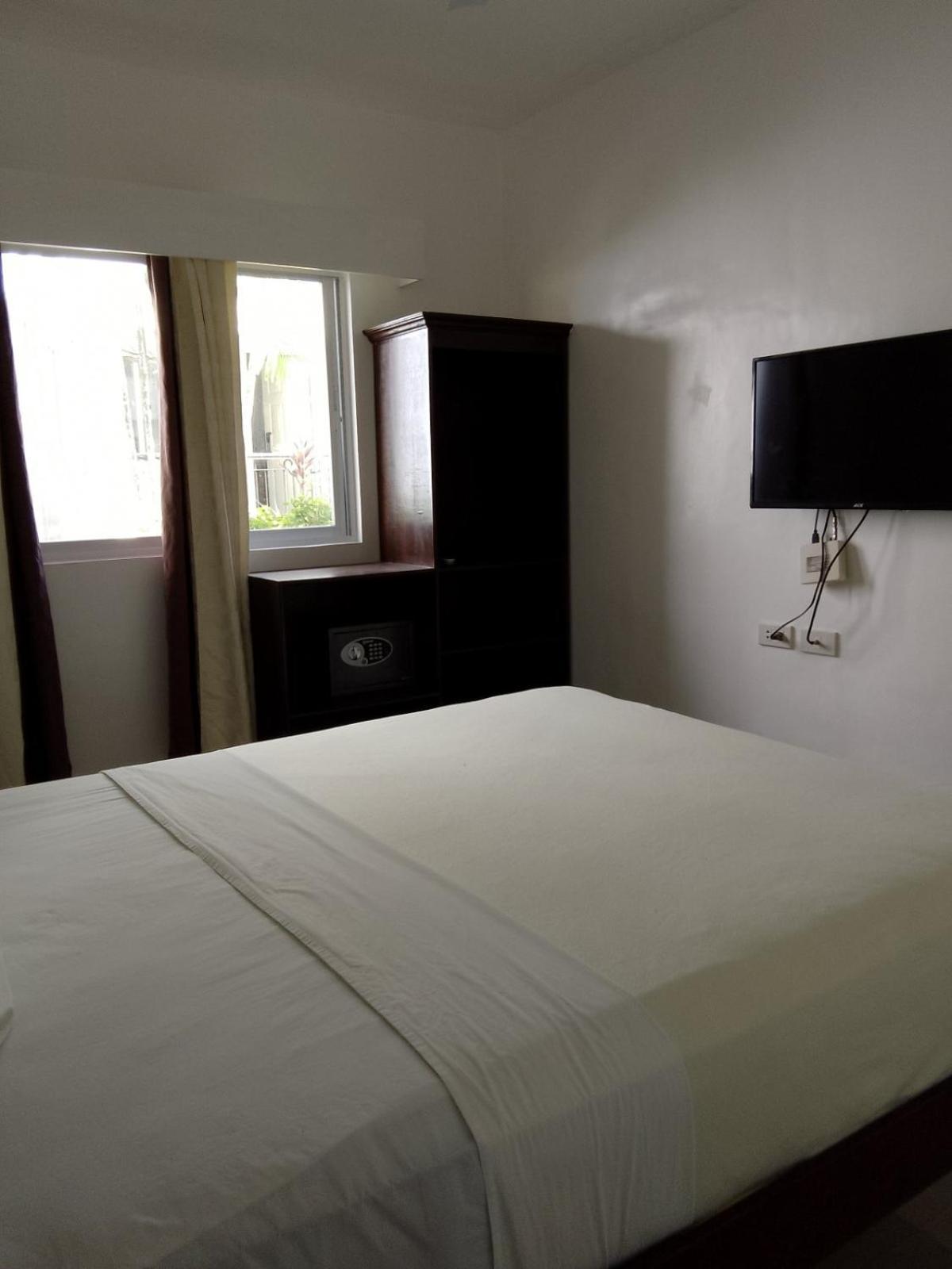 Heartland Hotel Serviced Rooms & Apartments. Панглао Екстериор снимка