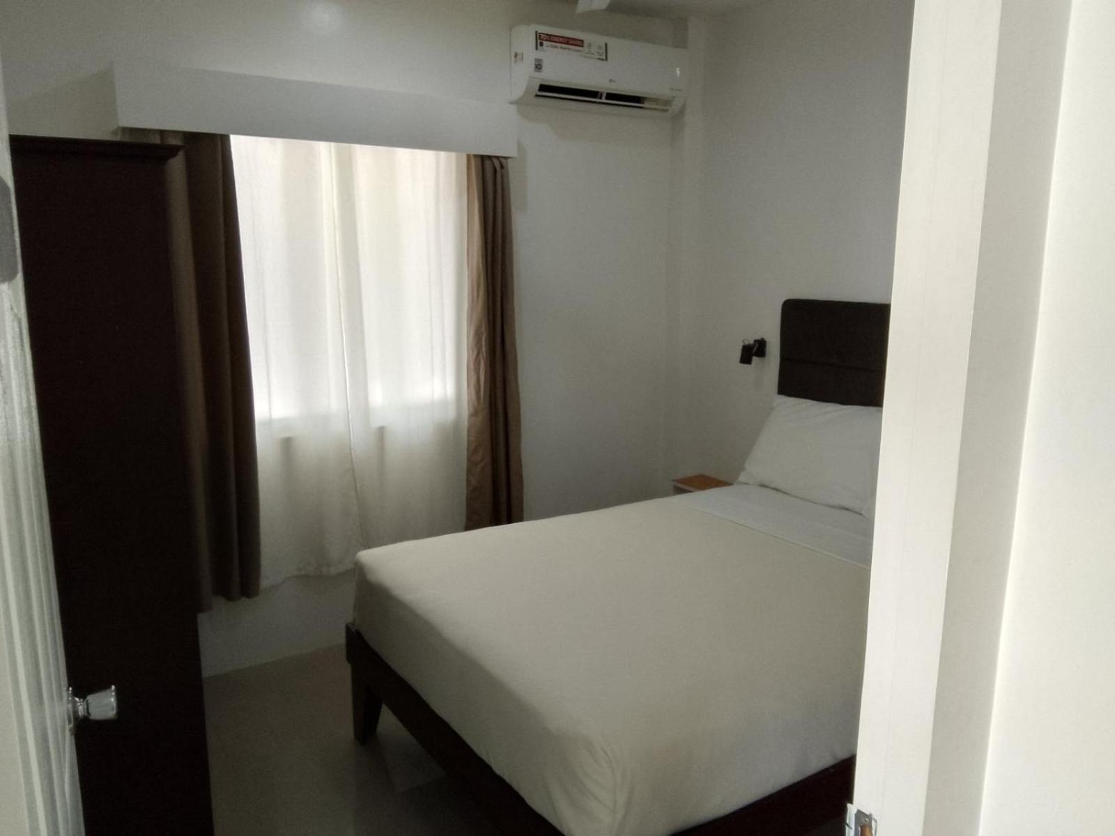Heartland Hotel Serviced Rooms & Apartments. Панглао Екстериор снимка