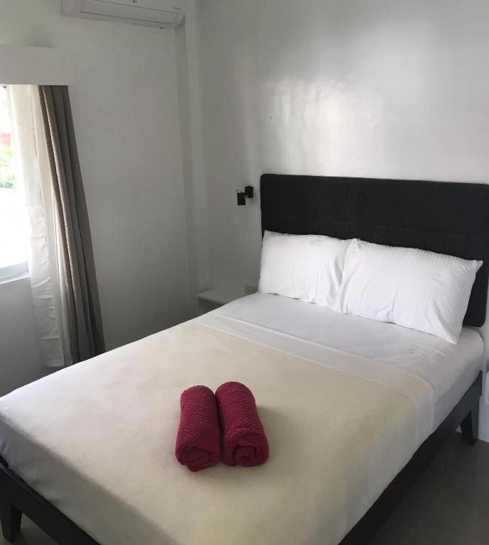 Heartland Hotel Serviced Rooms & Apartments. Панглао Екстериор снимка
