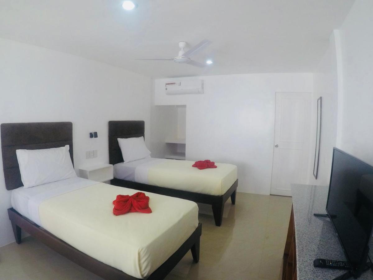 Heartland Hotel Serviced Rooms & Apartments. Панглао Екстериор снимка