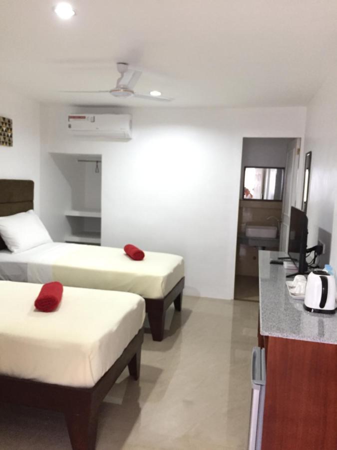 Heartland Hotel Serviced Rooms & Apartments. Панглао Екстериор снимка