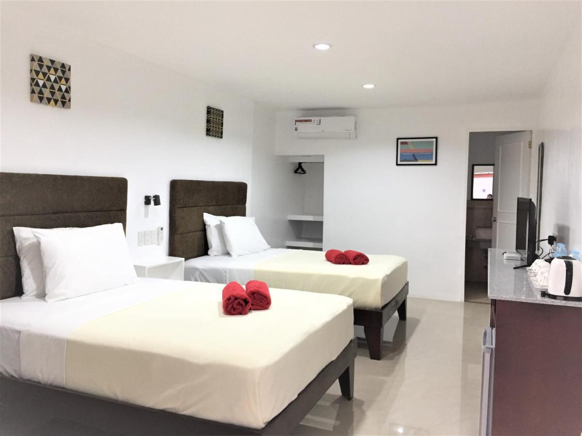 Heartland Hotel Serviced Rooms & Apartments. Панглао Екстериор снимка